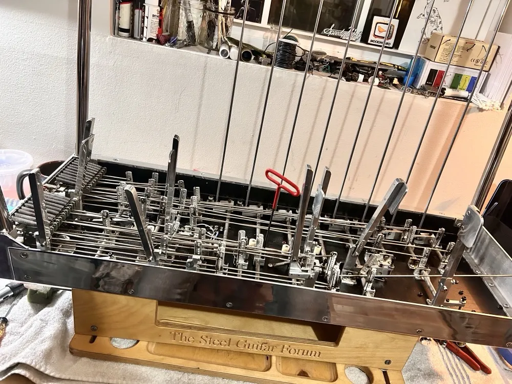 Close-up of a pedal steel's bell cranks, pull rods and return springs