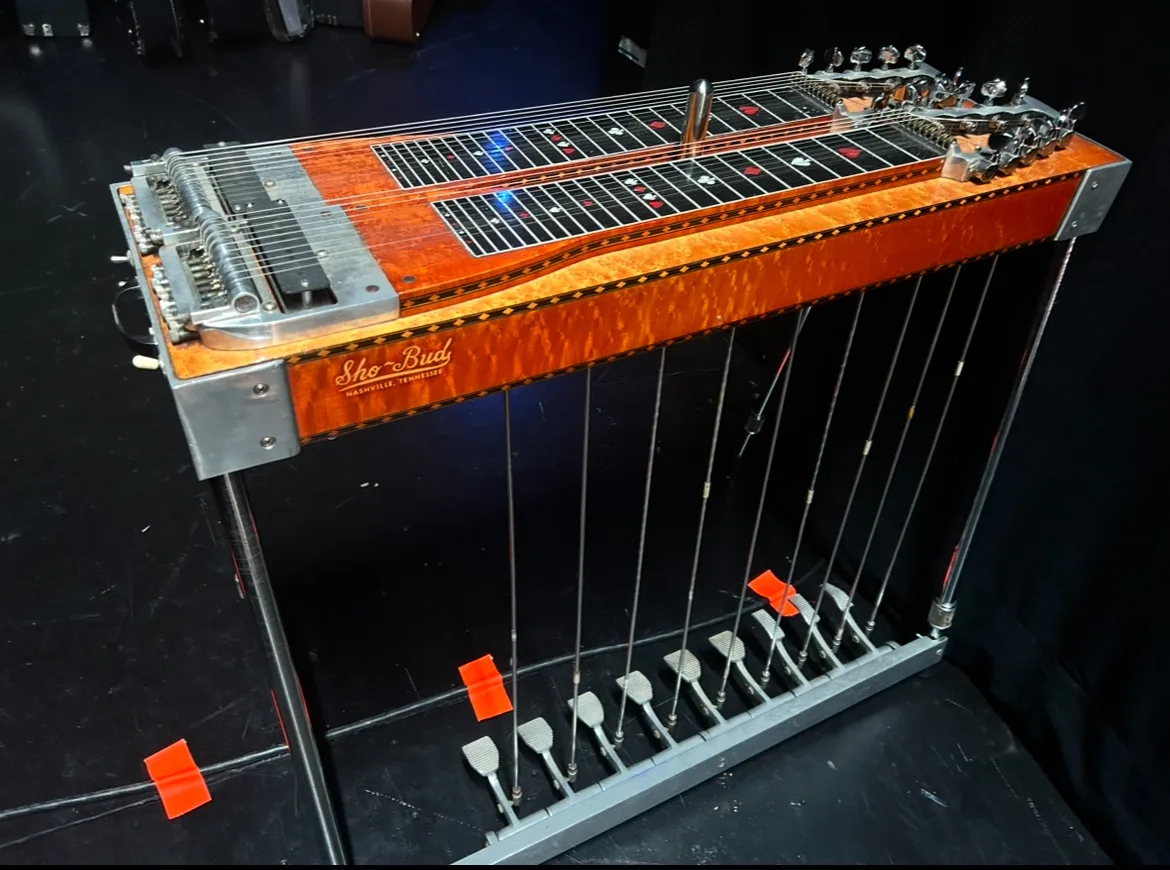 A Sho-Bud double-neck in birdseye maple, set up on stage