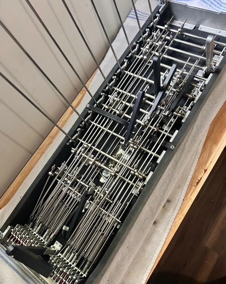 The underside of a pedal steel: pull rods, cross shafts and the changer